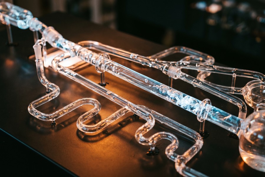 Diagram showing AI credit model inputs versus traditional FICO score inputs side by side