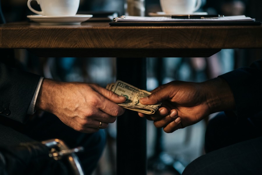 Side-by-side loan agreement comparison highlighting red flag contract clauses borrowers should reject