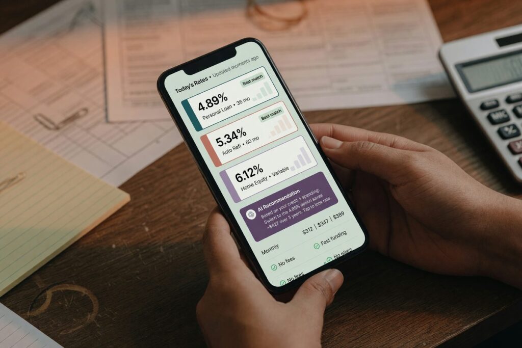 Person reviewing personalized loan offers on a digital platform interface showing multiple lender options and APR rates