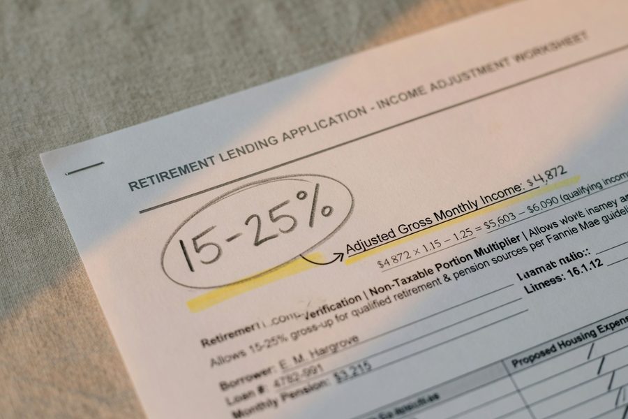Infographic comparing asset depletion income calculation steps for a retiree borrower