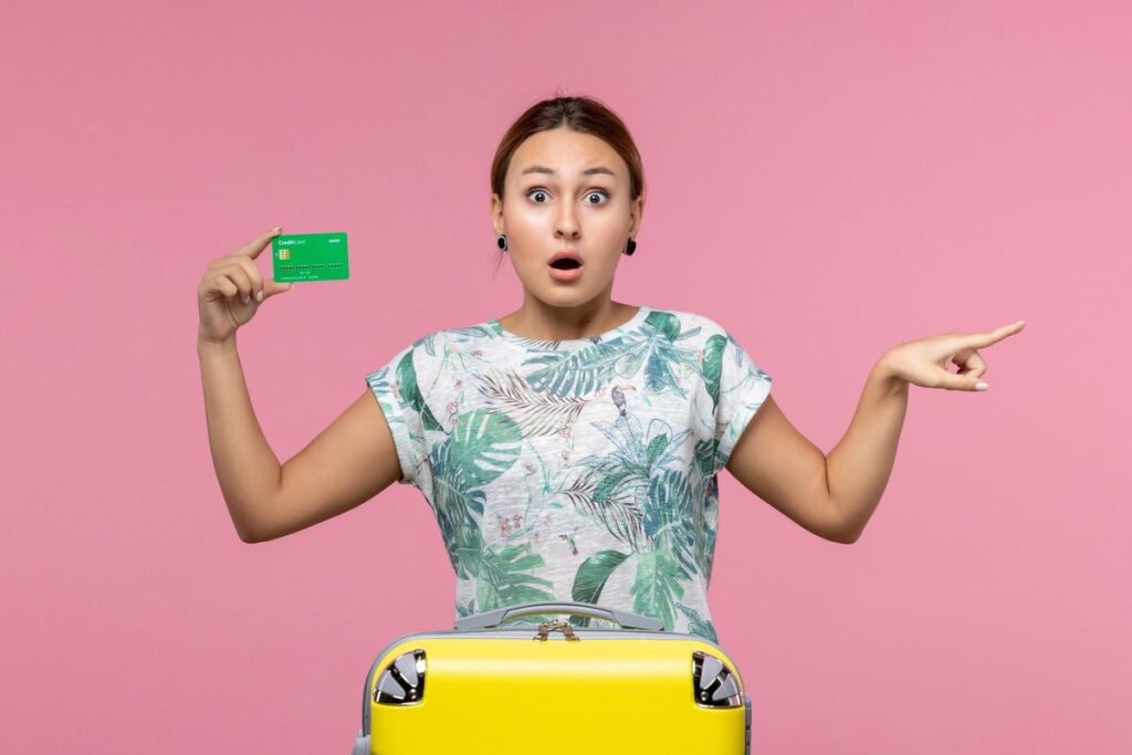 Comparison of travel credit cards showing rewards rates and benefits for 2025