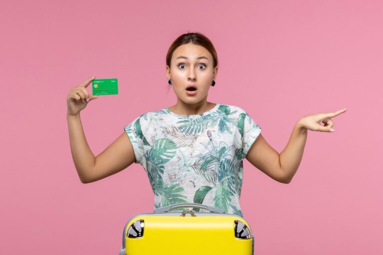 Comparison of travel credit cards showing rewards rates and benefits for 2025