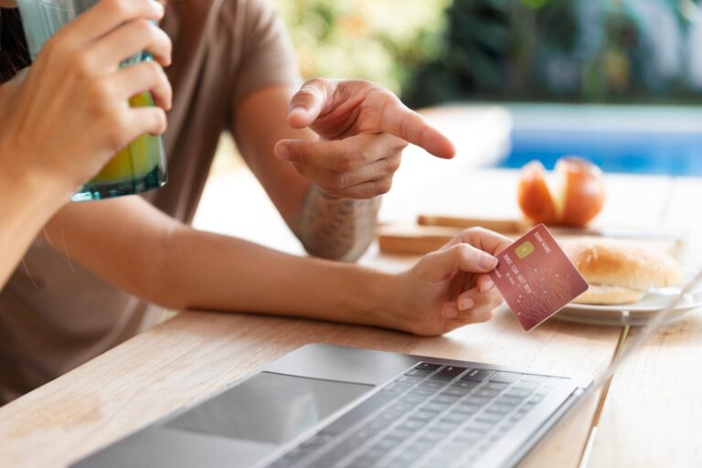 Eco-friendly credit card with green leaf design and carbon offset badge