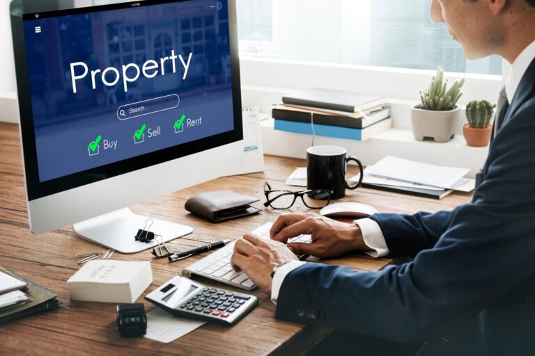 Landlord and tenant discussing rent payment reporting on tablet with fintech platform