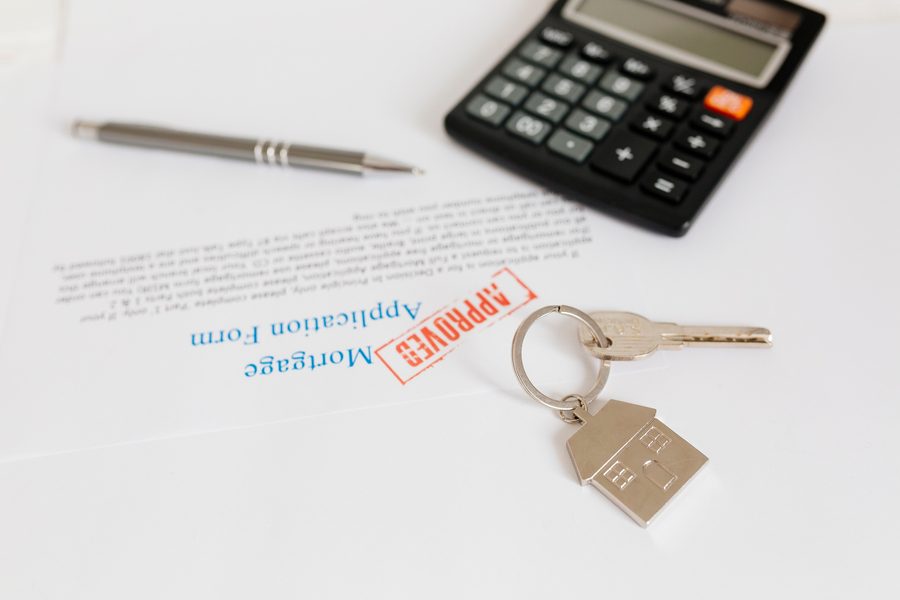 Homebuyer signing lock confirmation with timeline calendar open on phone